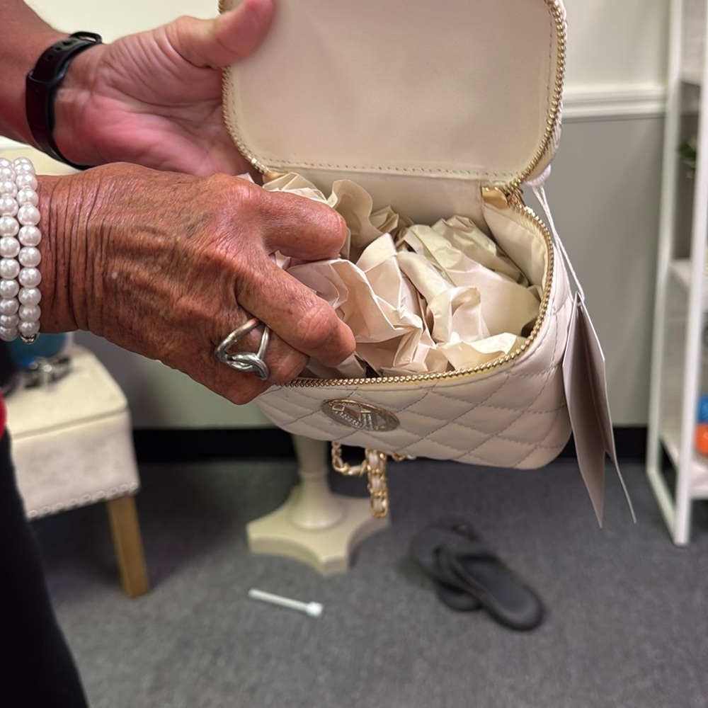 Valentino Orlandi Cream and Gold Mini Bag with Quilted Design
$99.00 TODAY ONLY - Picture 10 of 14